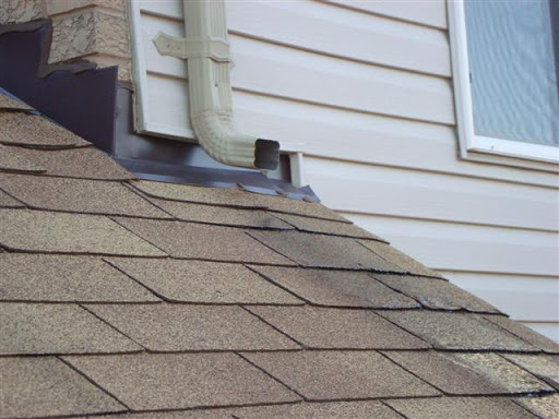 downspout extension shingle damage